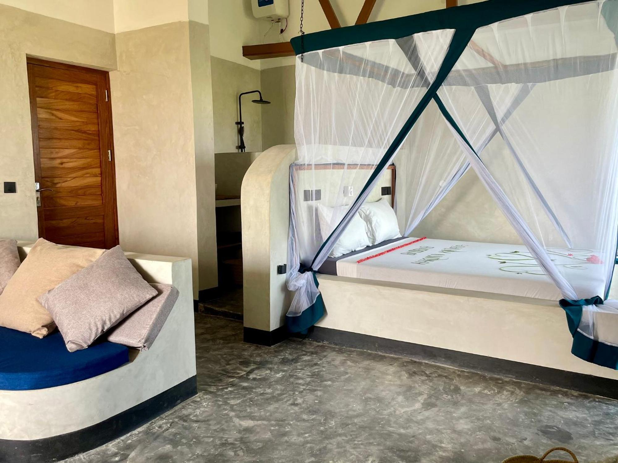 Baobab Bungalows Джамбиани Экстерьер фото
