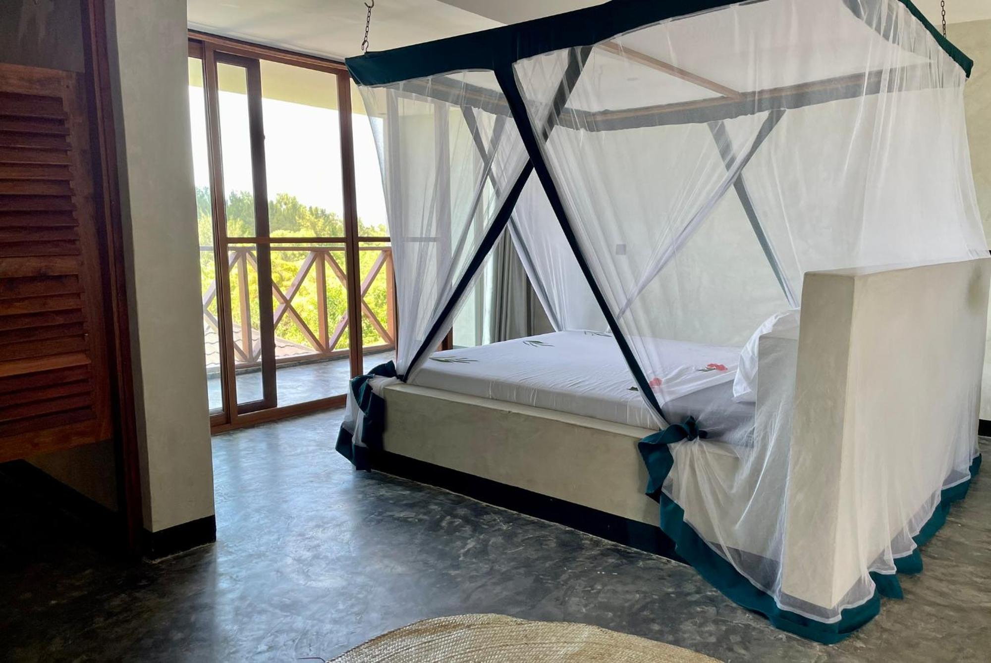 Baobab Bungalows Джамбиани Экстерьер фото